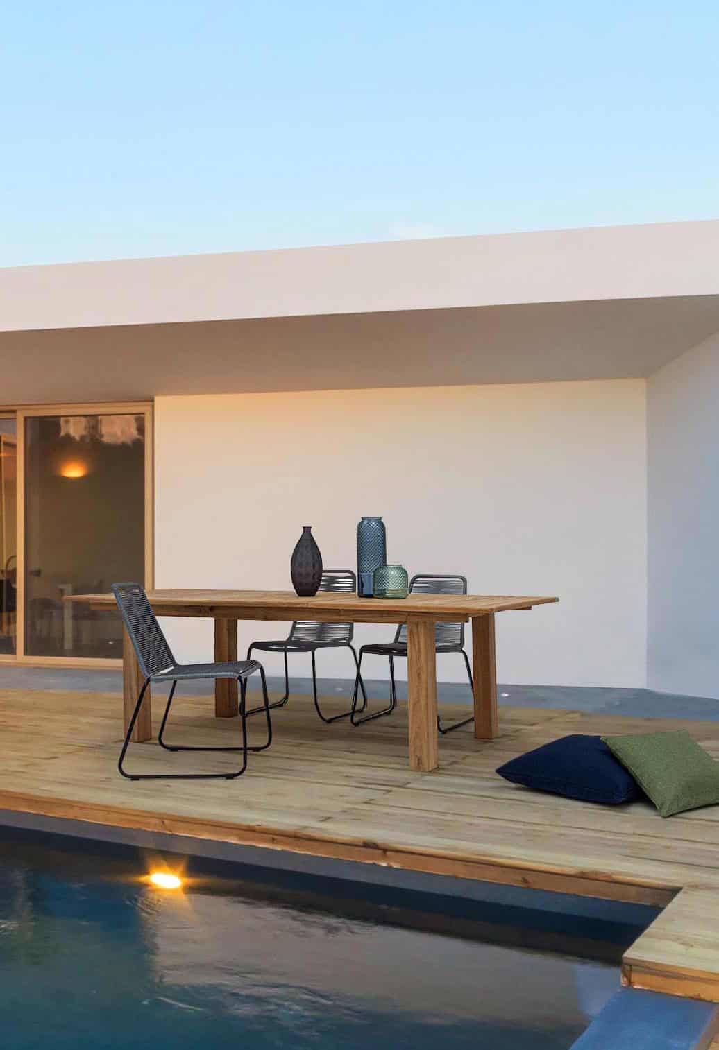 Modern house with garden swimming pool and wooden deck