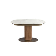 Tavolo da pranzo ovale allungabile con fusto in marmo porcellanato e noce