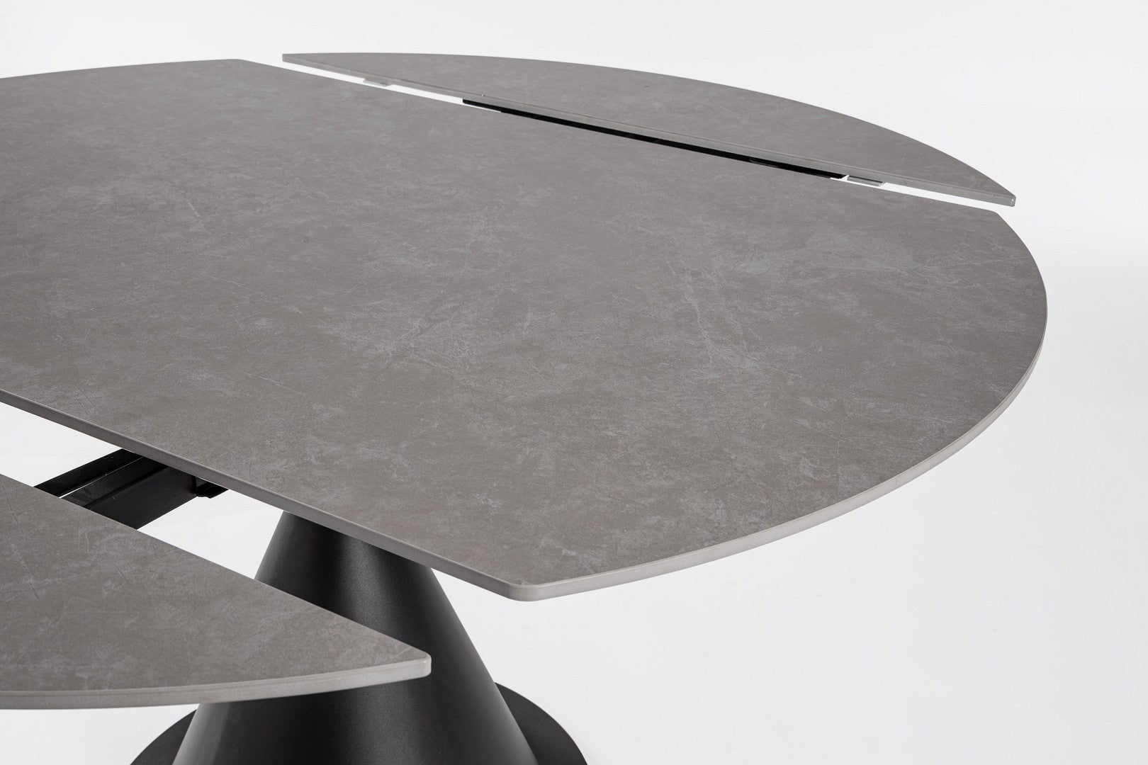 Tavolo rotondo allungabile in gres porcellanato effetto marmo 85-135 cm