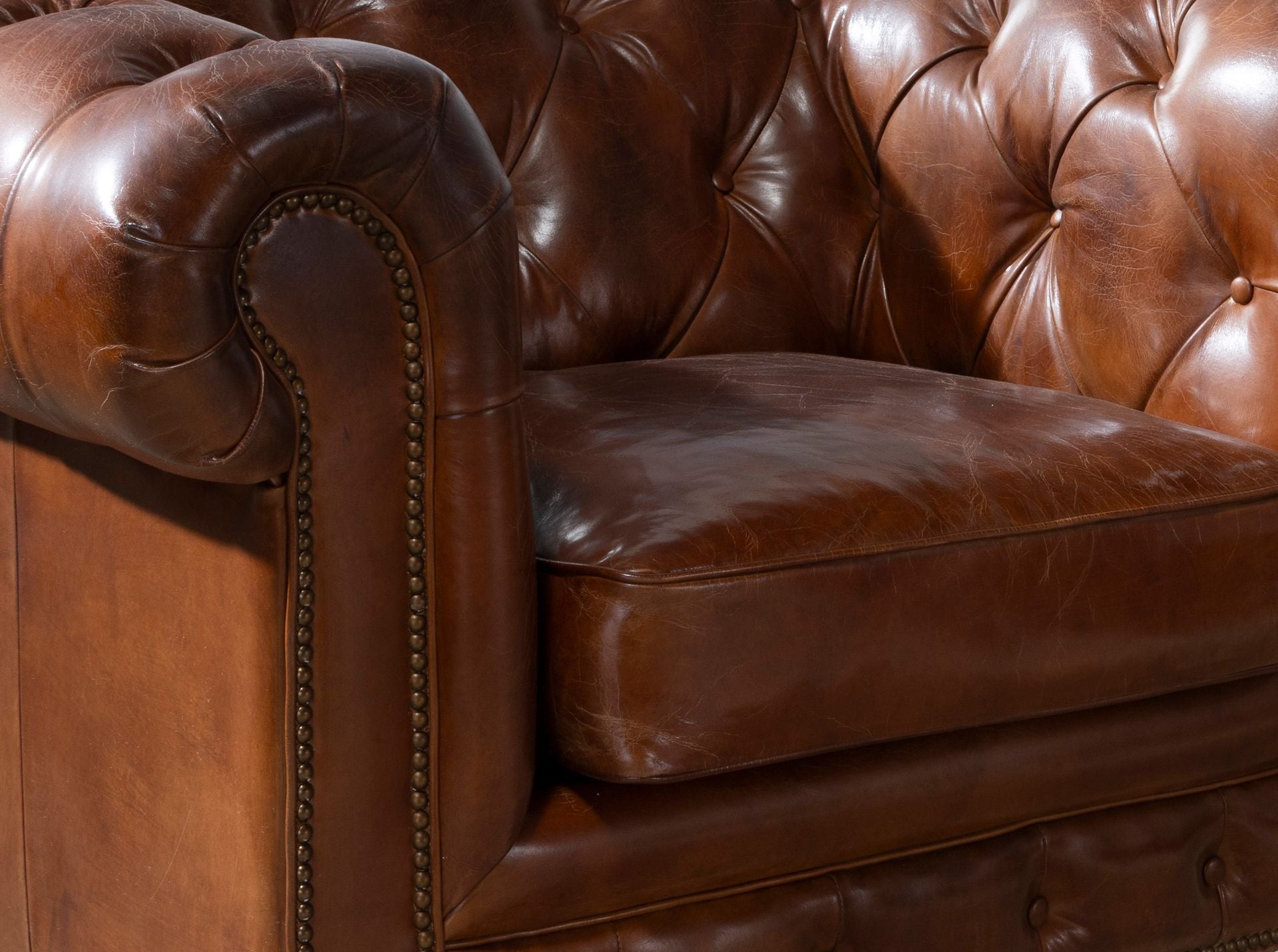 Poltrona Chester in pelle marrone cognac