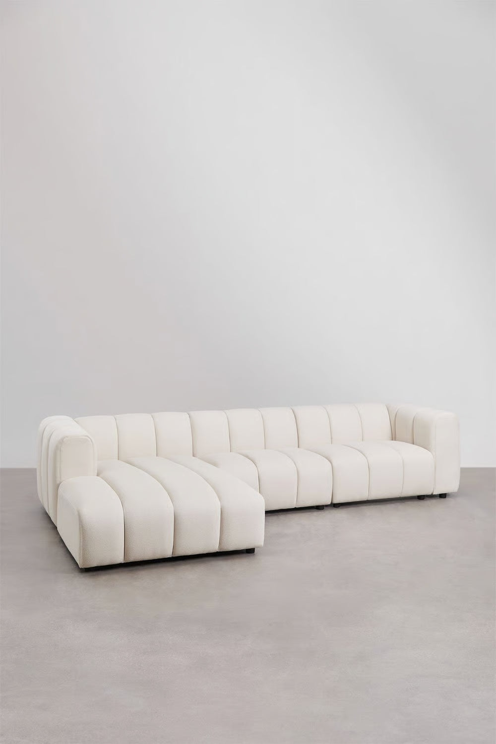 Divano modulare chaise longue sinistro a 3 pezzi in tessuto bouclé Eliot 315x170