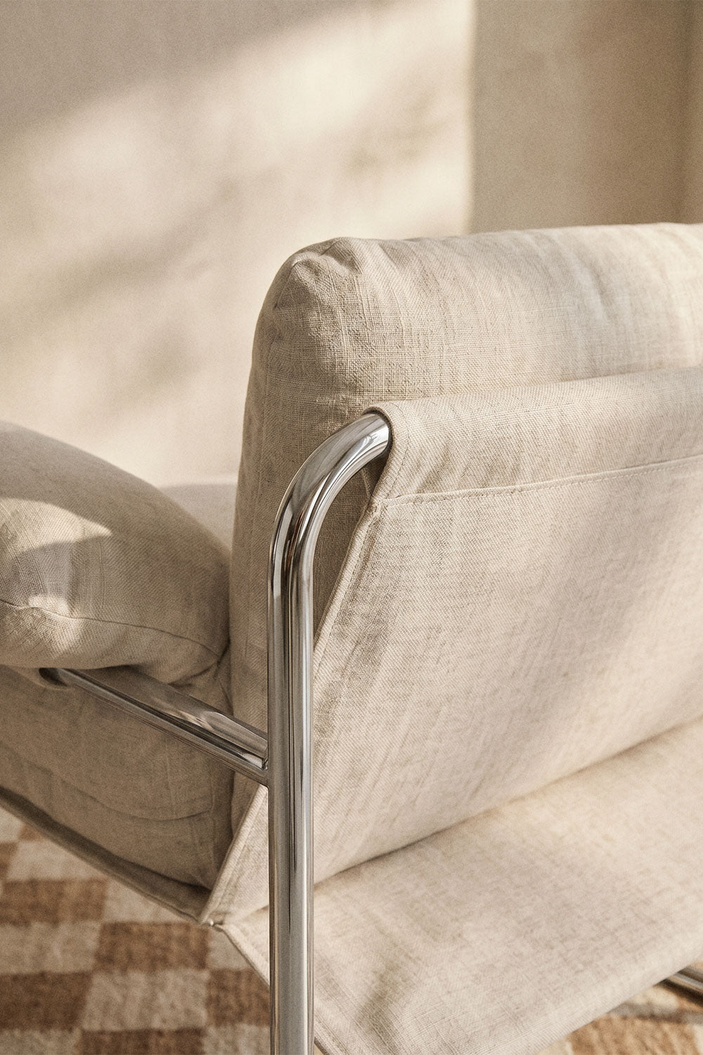 Evani - Poltrona in ciniglia e ferro